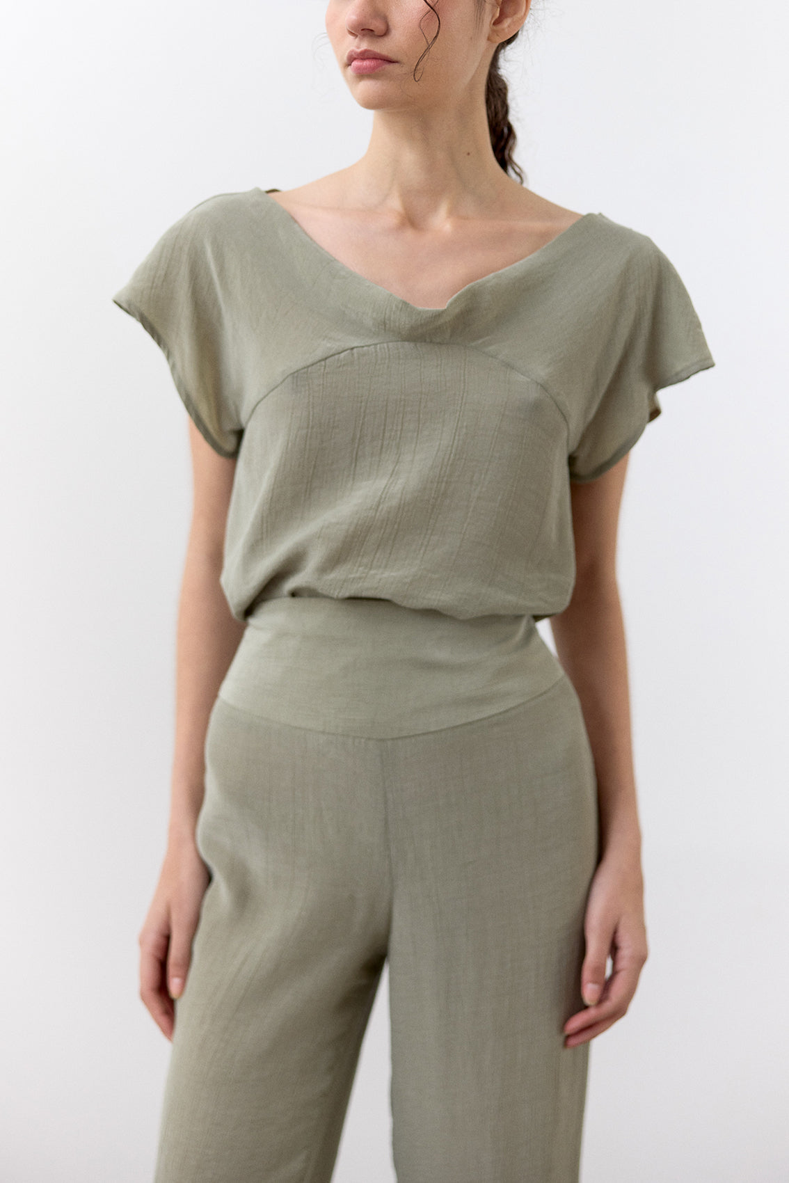 Curved Waistband Crinkle Lyocell Trousers - Musgo